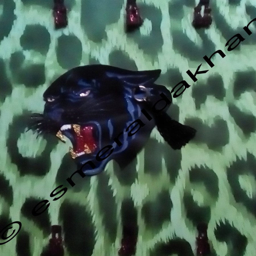 leopard print background colored in smaragd is creation by the designer